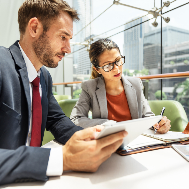 business-people-discussion-digital-tablet-technolo-2025-02-11-20-16-26-utc (1)